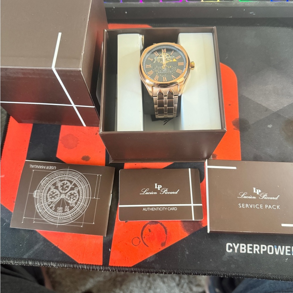 Lucien Piccard Gold and Black Watch